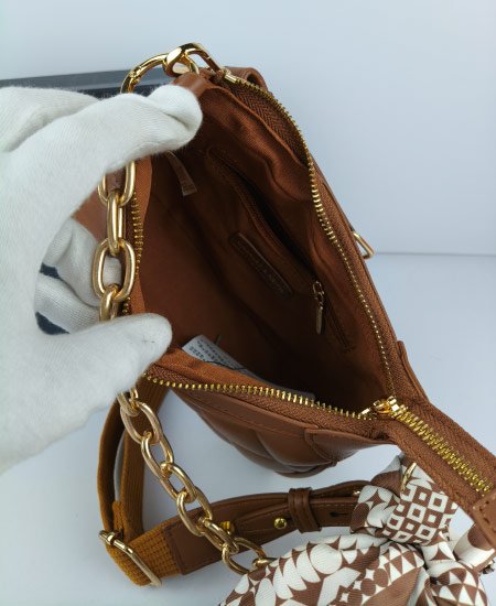 Charles and Keith Moon Face Brown Handbags