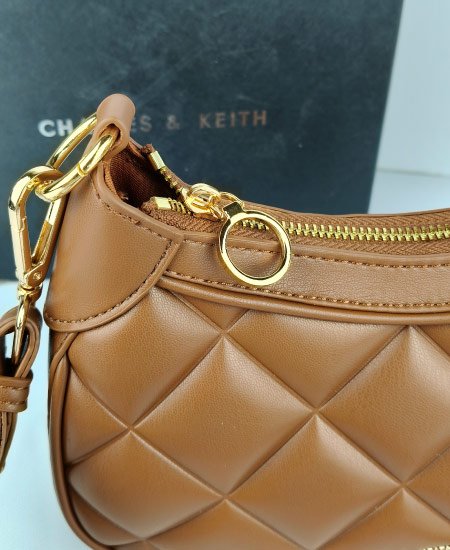 Charles and Keith Moon Face Brown Handbags