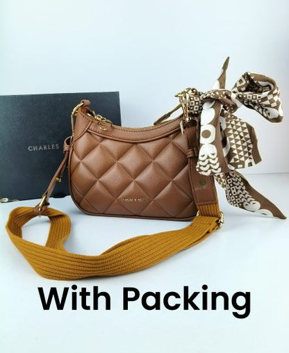Charles and Keith Moon Face Brown Handbags