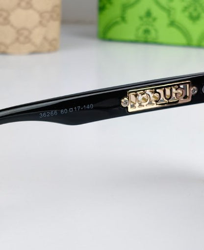 Gucci Black Sunglasses GG66